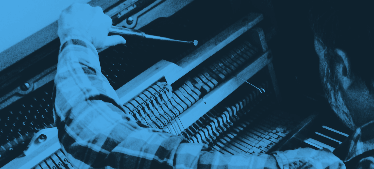 Piano being tuned