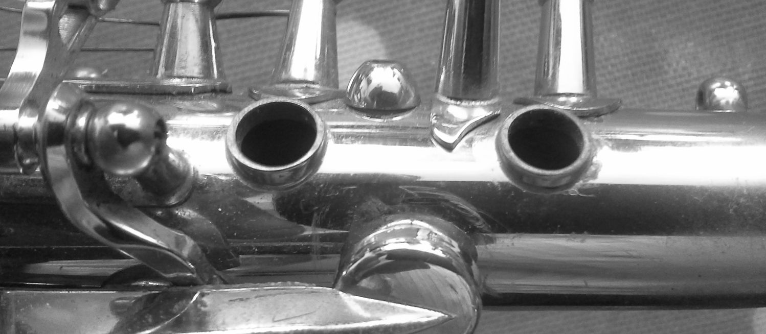 Saxophone being repaired